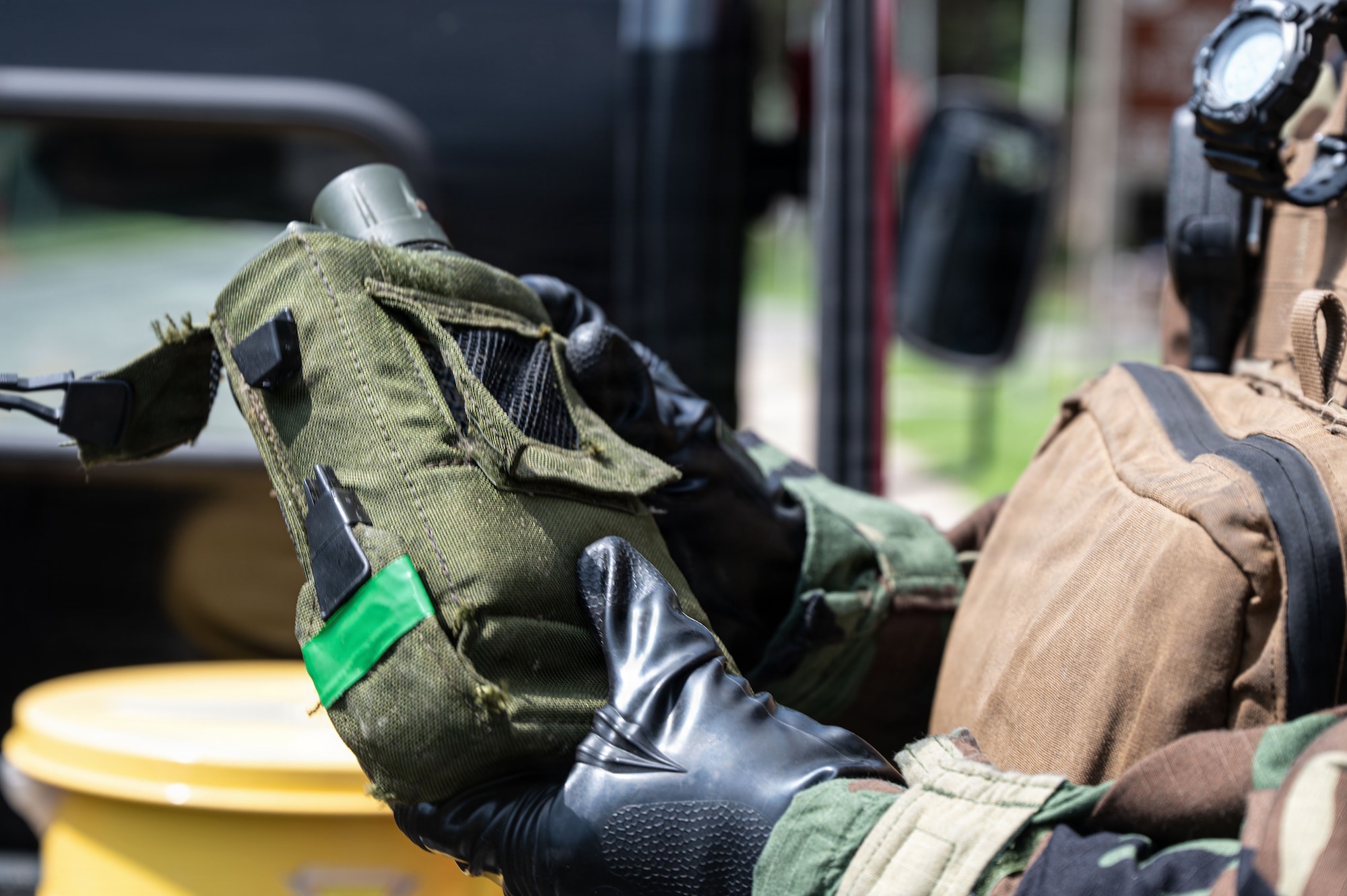 U.S. Marine Lance Cpl. Garrett Bruening, a Chemical, Biological, Radiological and Nuclear responder assigned to Marine Wing Support Squadron 171, Marine Air Station, Iwakuni, Japan, prepares a Joint Chemical Agent Detector during exercise Beverly Sentinel 26-4 at Kunsan Air Base, Republic of Korea, July 22, 2026. The JCAD detects the presence of chemical warfare agents and industrial chemical vapors. By exchanging tactics, techniques, and procedures, Airmen and Marines forged a dynamic and lethal operational playbook, honing capabilities to overcome complex challenges as a single, cohesive unit.