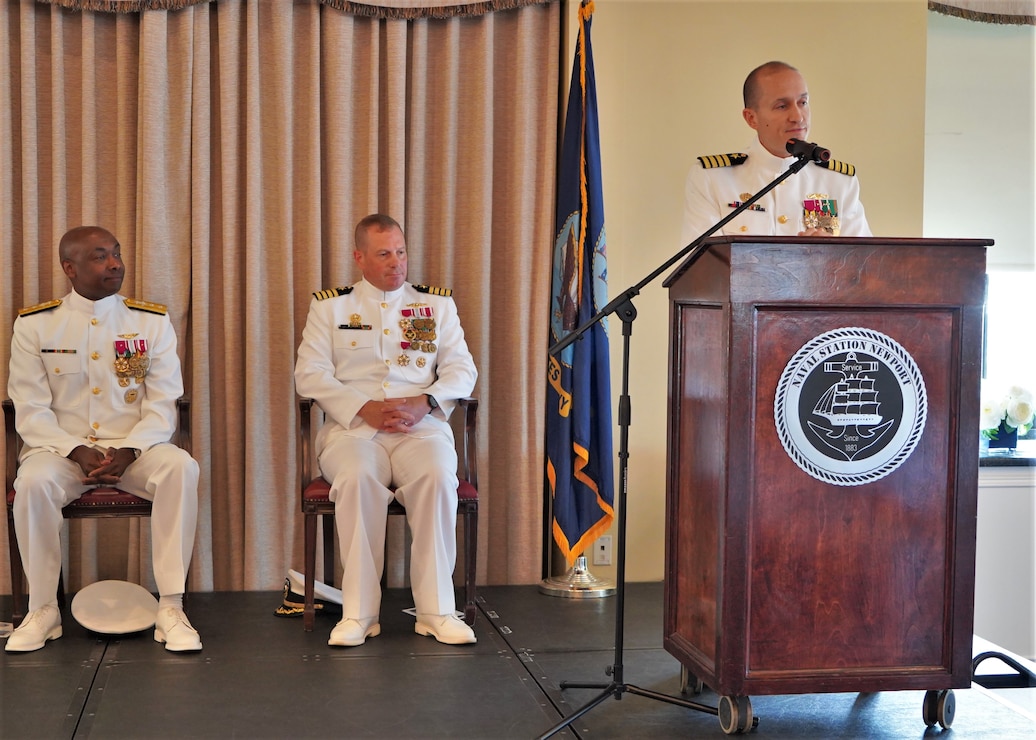 Captain Michael G. Charnota (Right) addresses the military and civilian guests during a traditional Change of Command Ceremony July 17, 2026 at the installation's Officers' Club