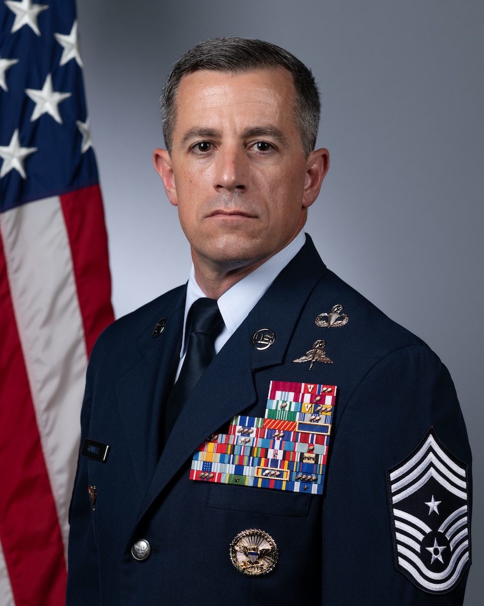 U.S. Air Force Chief Master Sgt. Thomas Gunnell, 27th Special Operations Wing command chief, poses for his official photo at Cannon Air Force Base, New Mexico, June 25, 2026. Gunnell advises the Wing Commander on all affairs involving the enlisted force at Cannon AFB. (U.S. Air Force photo by Staff Sgt. Nicholas Swift)