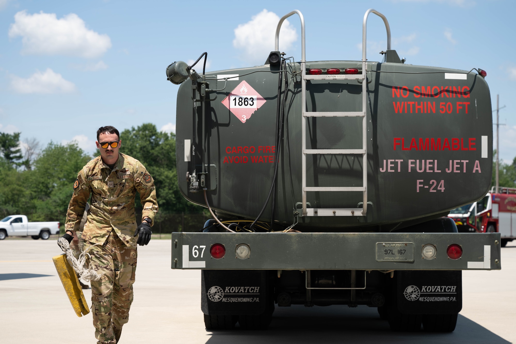 U.S. Air Force Senior Airman Brandon Rivas, 32nd Air Refueling Squadron instructor boom operator, walks away from a fuel truck while conducting specialized fueling operations at Joint Base McGuire-Dix-Lakehurst, N.J., June 29, 2026.