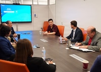 SAN ANTONIO (July 21, 2026) U.S. Army Lt. Col. Christopher Moon (center), chief of Translational Research, U.S. Army Institute of Surgical Research, speaks with the delegation from the Houston-based TradeIL South-Midwest USA of Israel’s Foreign Trade Administration at VelocityTX Innovation Center. Israel’s Foreign Trade Administration actively manages programs and events across different regions. Their North American and European divisions host targeted symposiums and exhibitions to promote Israel's top export categories, which are heavily focused on capital goods, integrated circuits, medical instruments, and advanced cybersecurity software. (U.S. Navy Photo by Burrell Parmer/Released)