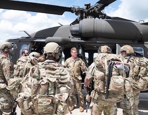 U.S. Army Soldiers from the Alpha Company, 2nd Assault Helicopter Battalion, 147th Aviation Regiment, Minnesota National Guard, give a safety brief about the UH-60 Black Hawk helicopter in St. Paul, Minn., June 10, 2026.
