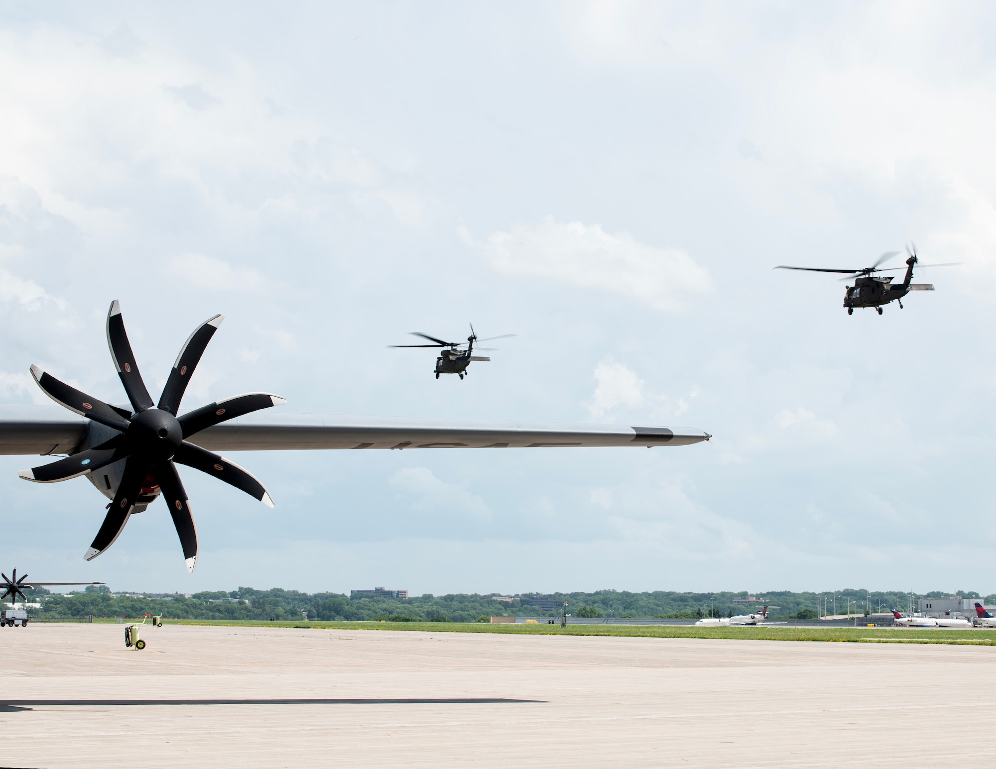 U.S. Army UH-60 Black Hawk helicopters from the Alpha Company, 2nd Assault Helicopter Battalion, 147th Aviation Regiment, Minnesota National Guard, take off in St. Paul, Minn., June 10, 2026.