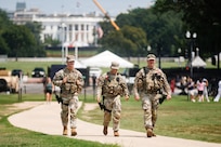 U.S. National Guardsmen with the Michigan National Guard, assigned to Joint Task Force – District of Columbia, in support of the DC Safe and Beautiful mission, patrol the National Mall in Washington, July 12, 2026.