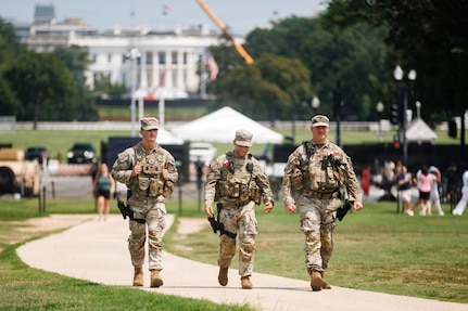 U.S. National Guardsmen with the Michigan National Guard, assigned to Joint Task Force – District of Columbia, in support of the DC Safe and Beautiful mission, patrol the National Mall in Washington, July 12, 2026.