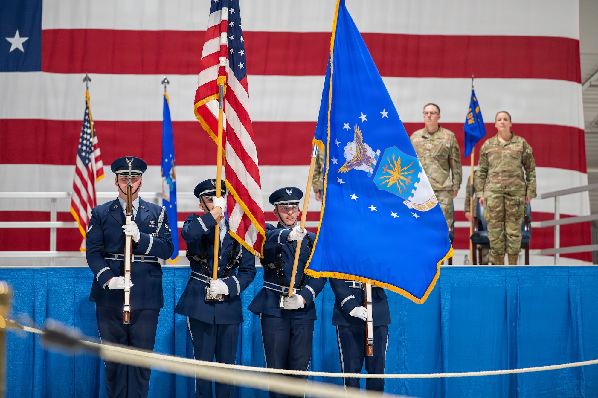 honor guard presents colors during change of command ceremony