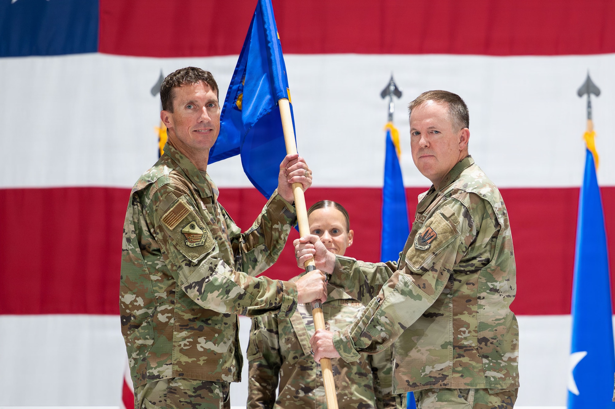 Colonel Glynn gives guidon to general epperson