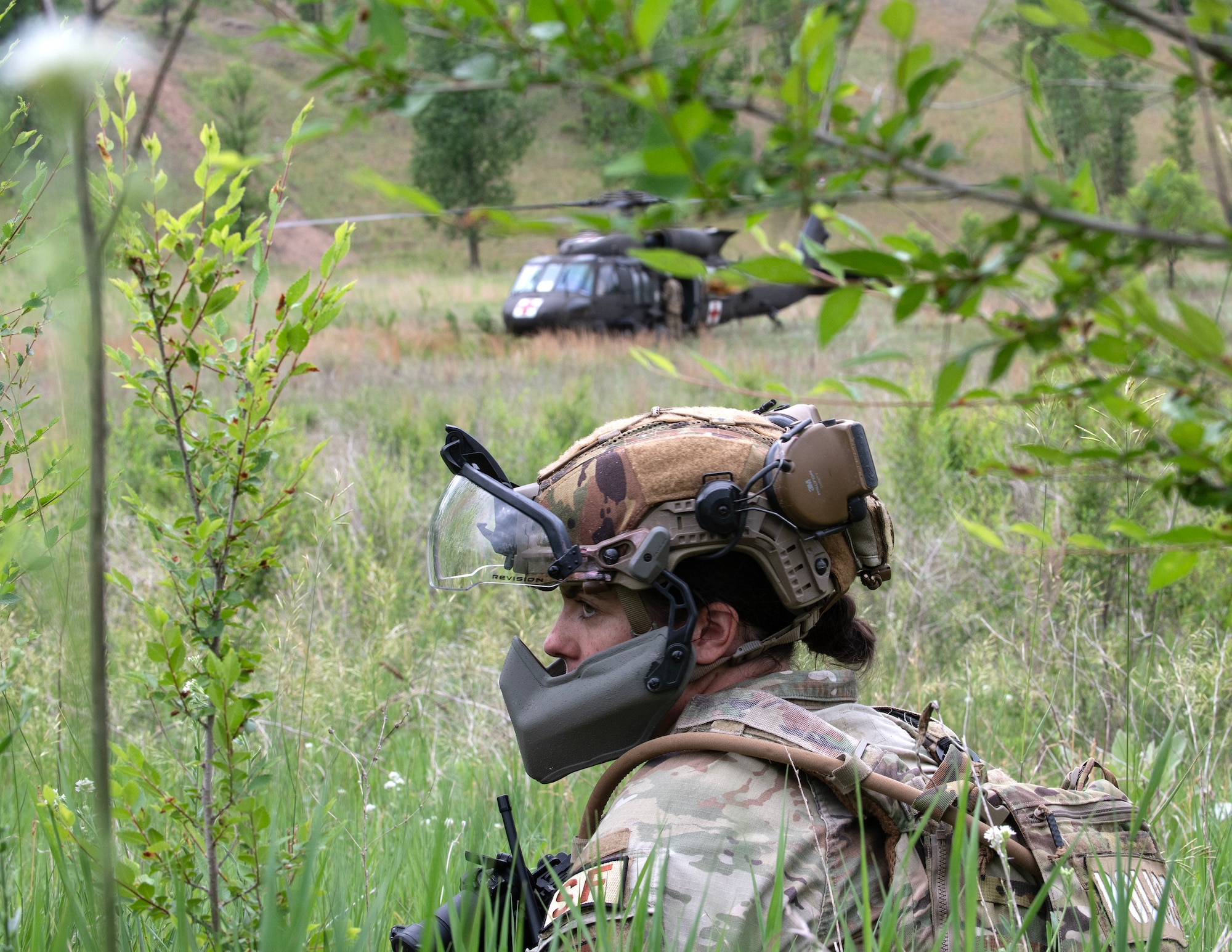 U.S. Air Force Senior Airman Lauren Brandt, 133rd Security Forces Squadron, provides security at a landing zone in Arden Hills, Minn., June 11, 2026.