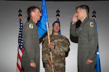 Col. Matthew Swanson  salutes Brig. Gen. David Epperson