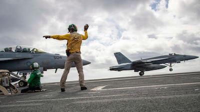 An F/A-18 Super Hornet, attached to Strike Fighter Squadron (VFA) 195 takes off from the flight deck of Nimitz-class aircraft carrier USS George Washington (CVN 73) while underway in the Philippine Sea, July 11, 2026. The George Washington Carrier Strike Group is operating in the U.S. 7th Fleet area of operations. George Washington is the U.S. Navy’s premier forward-deployed aircraft carrier, a long-standing symbol of the United States’ commitment to maintaining a free and open Indo-Pacific, while operating alongside allies and partners across the U.S. Navy’s largest numbered fleet. (U.S. Navy photo by Mass Communication Specialist 3rd Class Estrella Velarde)