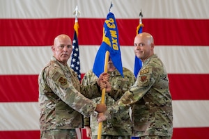 Guidon being passed to incoming commander