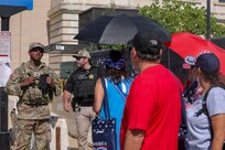 U.S. National Guard members supporting DC Safe and Beautiful assist the U.S. Secret Service during Independence Day celebrations along Constitution Avenue in Washington, D.C., July 4, 2026. About 5,000 National Guard members are supporting the mission, providing critical assistance to the Metropolitan Police Department to help ensure the safety of residents, commuters, and visitors throughout the District.