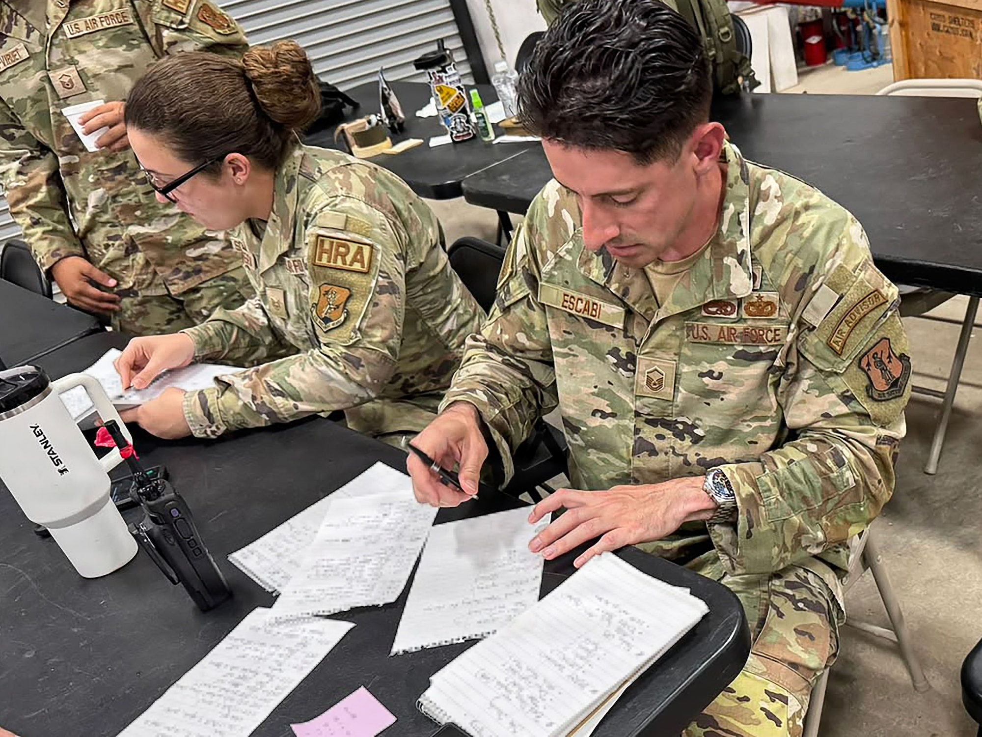 U.S. Air Force Master Sgt. Roberto Escabi, base services specialist, 156th Force Support Squadron, Puerto Rico National Guard, conducts command and control for mortuary affairs search and recovery operations during fiscal year 2026 Home Station Readiness Training at Joint Base Pearl Harbor-Hickam, Hawaii, June 22, 2026. The FY26 HSRT is a Joint total force integration training involving the 140th FSS, 154th FSS, 142nd FSS, 936th FSS, and 156th FSS, designed to test participants expeditionary capabilities and ensure that force support personnel are prepared to perform their mission in a contested environment. (U.S. Air National Guard courtesy photo)