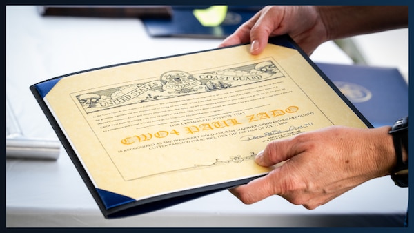 U.S. Coast Guard Chief Warrant Officer Paul Zado's retirement paperwork is shown here during his retirement ceremony in New Orleans, Louisiana, July 10, 2026. Zado and the crew of the USCGC Pamlico were responsible for developing an alternate waterway following hurricane Ida's devastation of the lower Mississippi River. (U.S. Coast Guard photo by Petty Officer 3rd Class Cheyenne Basurto)