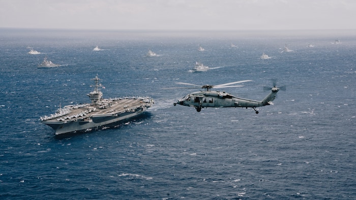 The Nimitz-class aircraft carrier USS Theodore Roosevelt (CVN 71) leads a group sail July 22, 2026, in the Pacific Ocean off the coast of Hawaii during Exercise Rim of the Pacific 2026. Thirty nations, 30 ships, five submarines, 15 national land forces, more than 190 aircraft and more than 30,000 personnel are participating in RIMPAC in and around the Hawaiian Islands, June 24 to July 31.