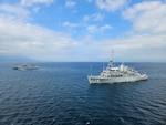 U.S. Navy Avenger-class mine countermeasures ship USS Chief (MCM 14) and Japan Maritime Self-Defense Force coastal mine sweepers JS Kuroshima (MSC-692), left, and JS Miyajima (MSC-690), back right, conduct a group sail during Mine Warfare Exercise 2JA, July 20, 2026. 2JA is part of a year-long series of bilateral exercises between the U.S. Navy and JMSDF to strengthen interoperability and increase proficiency in mine countermeasure operations. (U.S. Navy photo by Lt. Jacob Kinnear)