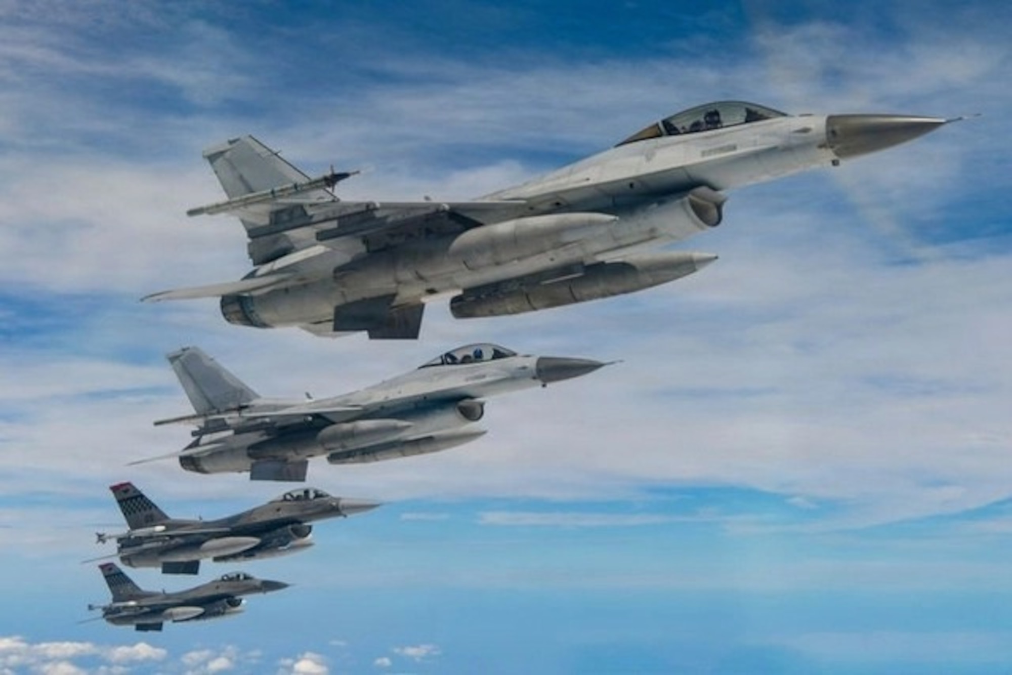 The Republic of Korea and U.S. Air Forces are conducting the 2nd Twin Eagle Exercise (2026-2) at Jungwon Air Base from the 13th to the 16th. Participating in this exercise are ROK Air Force F-16s, KF-16s, F-35A aircraft, and FA-50s, as well as U.S. Air Force F-16s. The photo shows ROK and U.S. Air Force fighter jets participating in the exercise moving into the training airspace on the 14th. From left: two U.S. Air Force F-16s and two ROK Air Force F-16s. (Courtesy Photo)