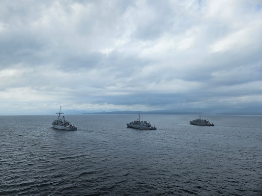 From left, U.S. Navy Avenger-class mine countermeasures ship USS Chief (MCM 14), and Japan Maritime Self-Defense Force coastal mine sweepers JS Miyajima (MSC-690) and JS Kuroshima (MSC-692) conduct a group sail during Mine Warfare Exercise 2JA, July 20, 2026. 2JA is part of a year-long series of bilateral exercises between the U.S. Navy and JMSDF to strengthen interoperability and increase proficiency in mine countermeasure operations. (U.S. Navy photo by Lt. Jacob Kinnear)
