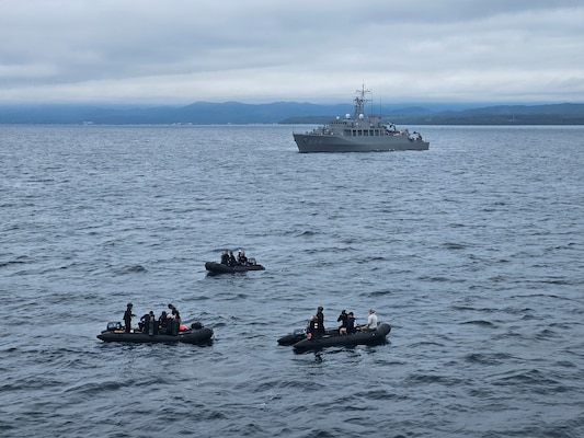 Explosive Ordnance Disposal Mobile Unit 5 and Japan Maritime Self-Defense Force explosive ordnance disposal sailors conduct mine countermeasure diving operations near JMSDF ocean mine sweeper JS Awaji (MSO-304) during Mine Warfare Exercise (MINEX) 2JA, July 14, 2026. 2JA is part of a year-long series of bilateral exercises between the U.S. Navy and Japan Maritime Self-Defense Force MSDF to strengthen interoperability and increase proficiency in mine countermeasure operations. (U.S. Navy photo by Lt. Jacob Kinnear)