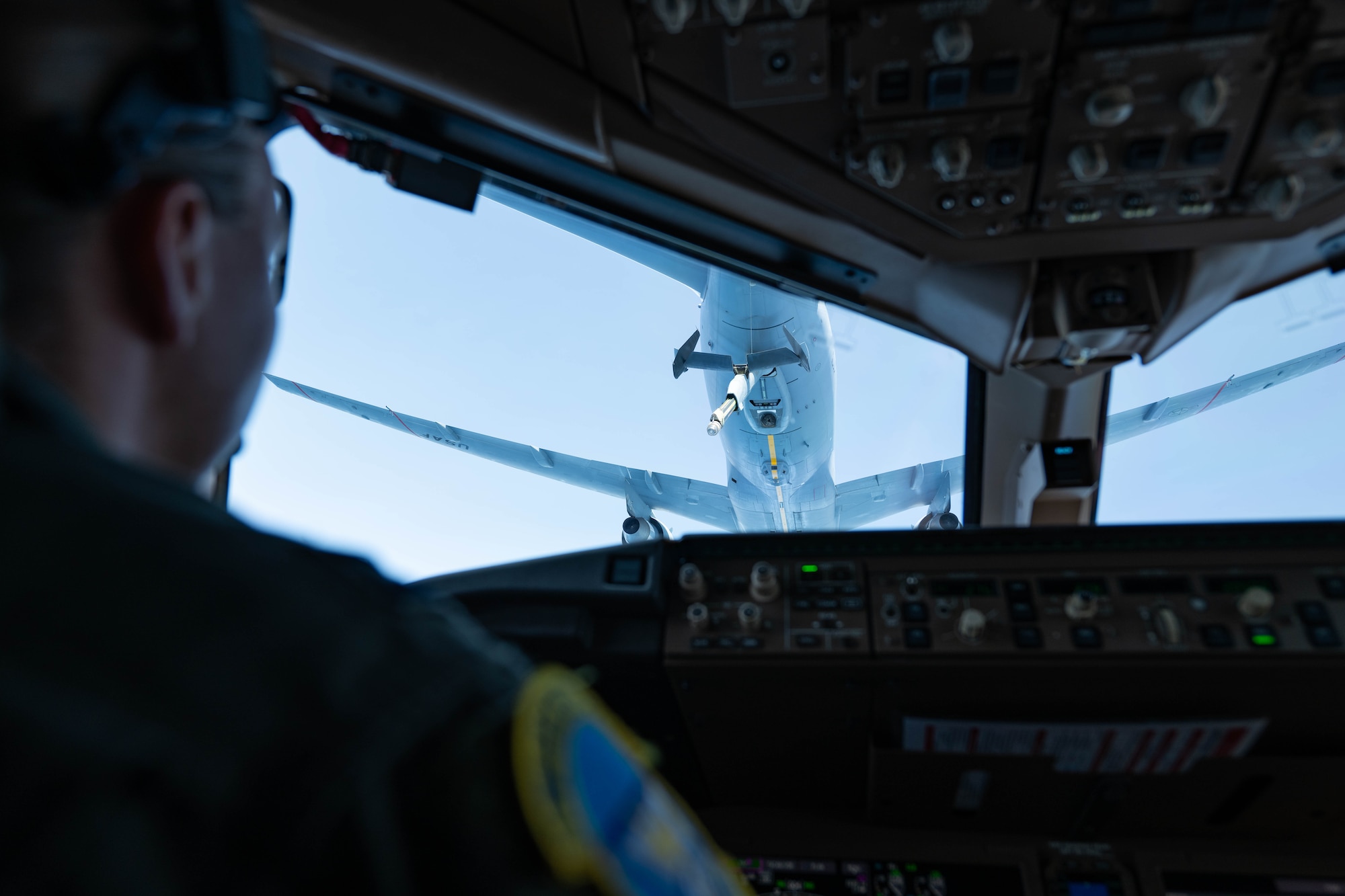 U.S. Air Force Capt. Anna Tuma, 32nd Air Refueling Squadron pilot, positions a KC-46A Pegasus, Aircraft for aerial refueling during a flight over the Atlantic Ocean, June 29, 2026.