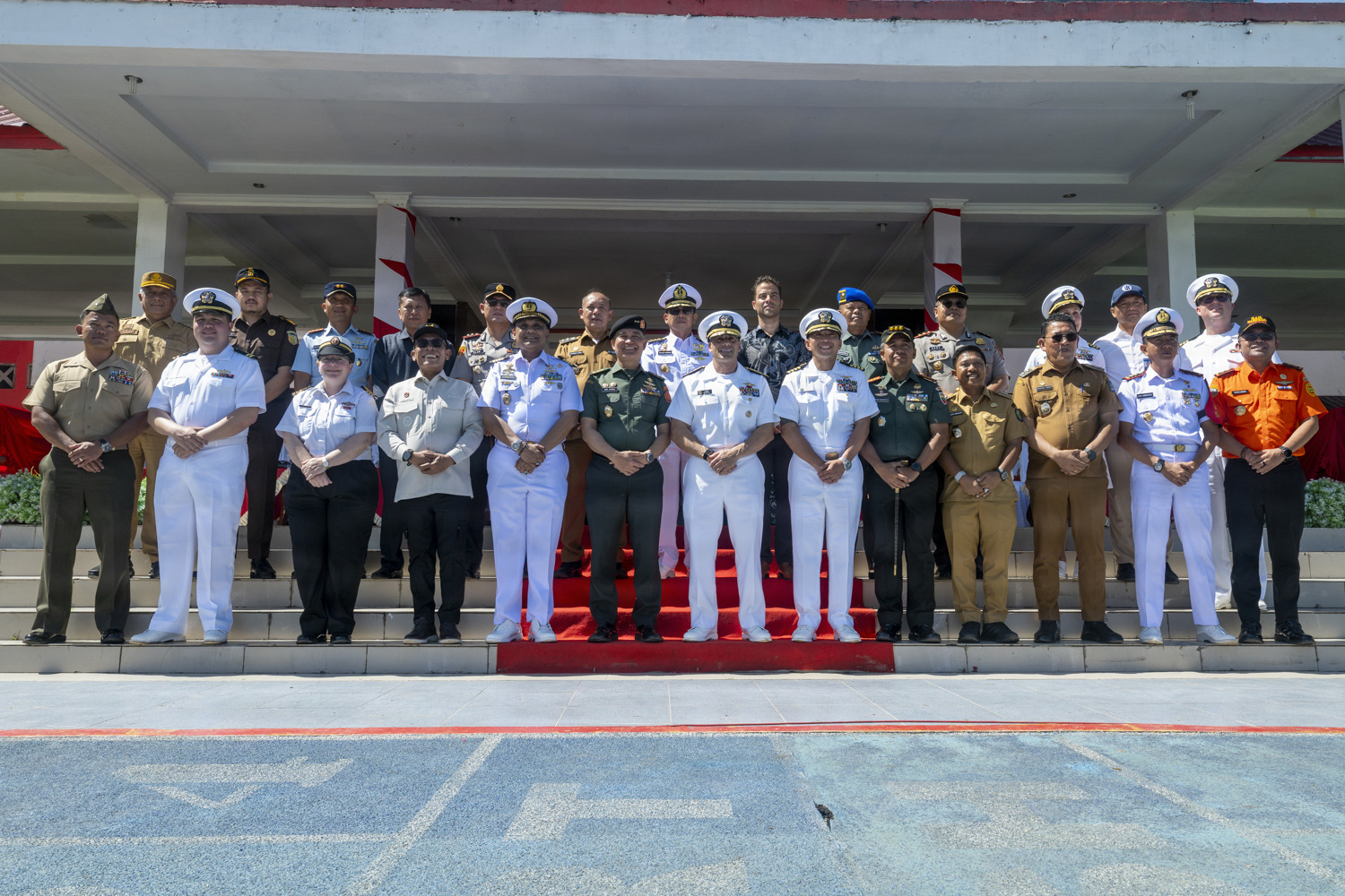 Leaders of Pacific Partnership 2026 (PP26), U.S. Consulate Medan, U.S. Embassy Jakarta, and Indonesian National Armed Forces (Tentara Nasional Indonesia) pose for a group photo during the PP26 Indonesia mission stop opening ceremony in Sibolga, Indonesia, July 21, 2026.