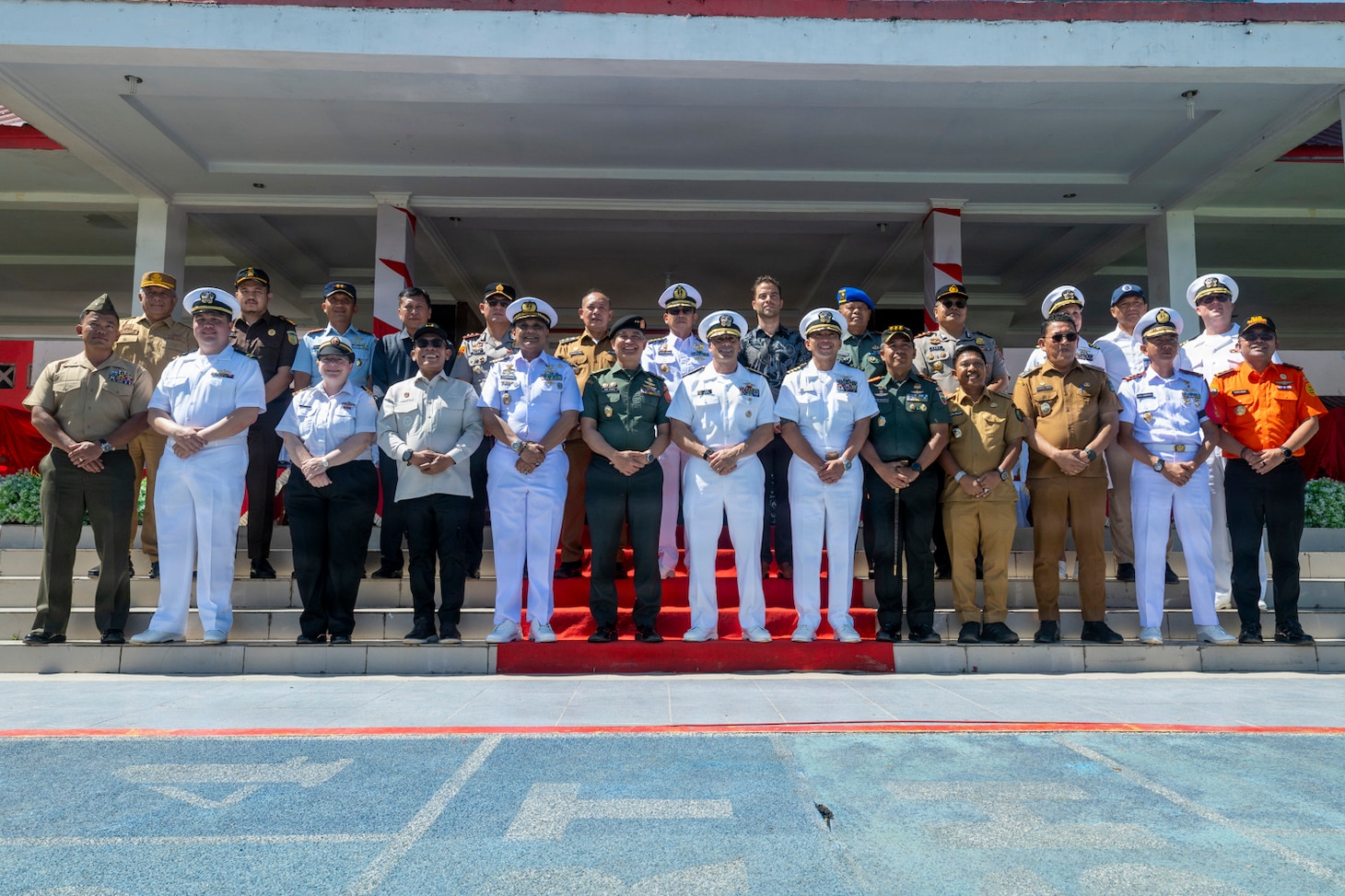 Leaders of Pacific Partnership 2026 (PP26), U.S. Consulate Medan, U.S. Embassy Jakarta, and Indonesian National Armed Forces (Tentara Nasional Indonesia) pose for a group photo during the PP26 Indonesia mission stop opening ceremony in Sibolga, Indonesia, July 21, 2026.