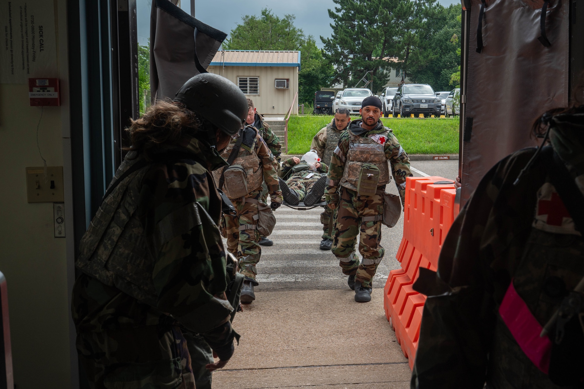 U.S. Air Force Airmen assigned to the 8th Medical Group carry a simulated casualty into the medical facility during exercise Beverly Sentinel 26-4, at Kunsan Air Base, Republic of Korea, July 23, 2026. Bev. Sent. 26-4 focused on refining operational communication and processes while honing the 8th Fighter Wing’s ability to survive and operate in a contested environment. (U.S. Air Force photo by Staff Sgt. Cedrique Oldaker)