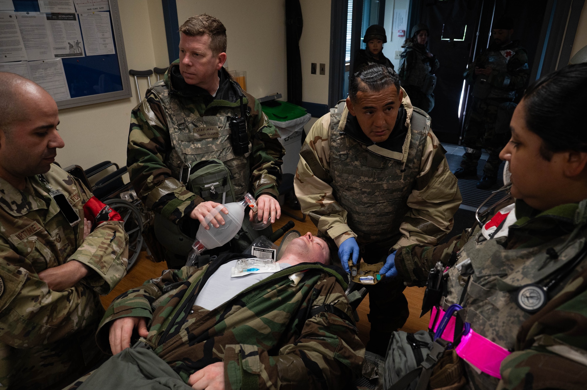 U.S. Air Force Airmen assigned to the 8th Medical Group perform clinical triage on a simulated casualty during exercise Beverly Sentinel 26-4, at Kunsan Air Base, Republic of Korea, July 23, 2026. The Wolf Pack focused on honing life-saving techniques and strategies to ensure its Airmen’s medical readiness supports a prepared posture. (U.S. Air Force photo by Staff Sgt. Cedrique Oldaker)