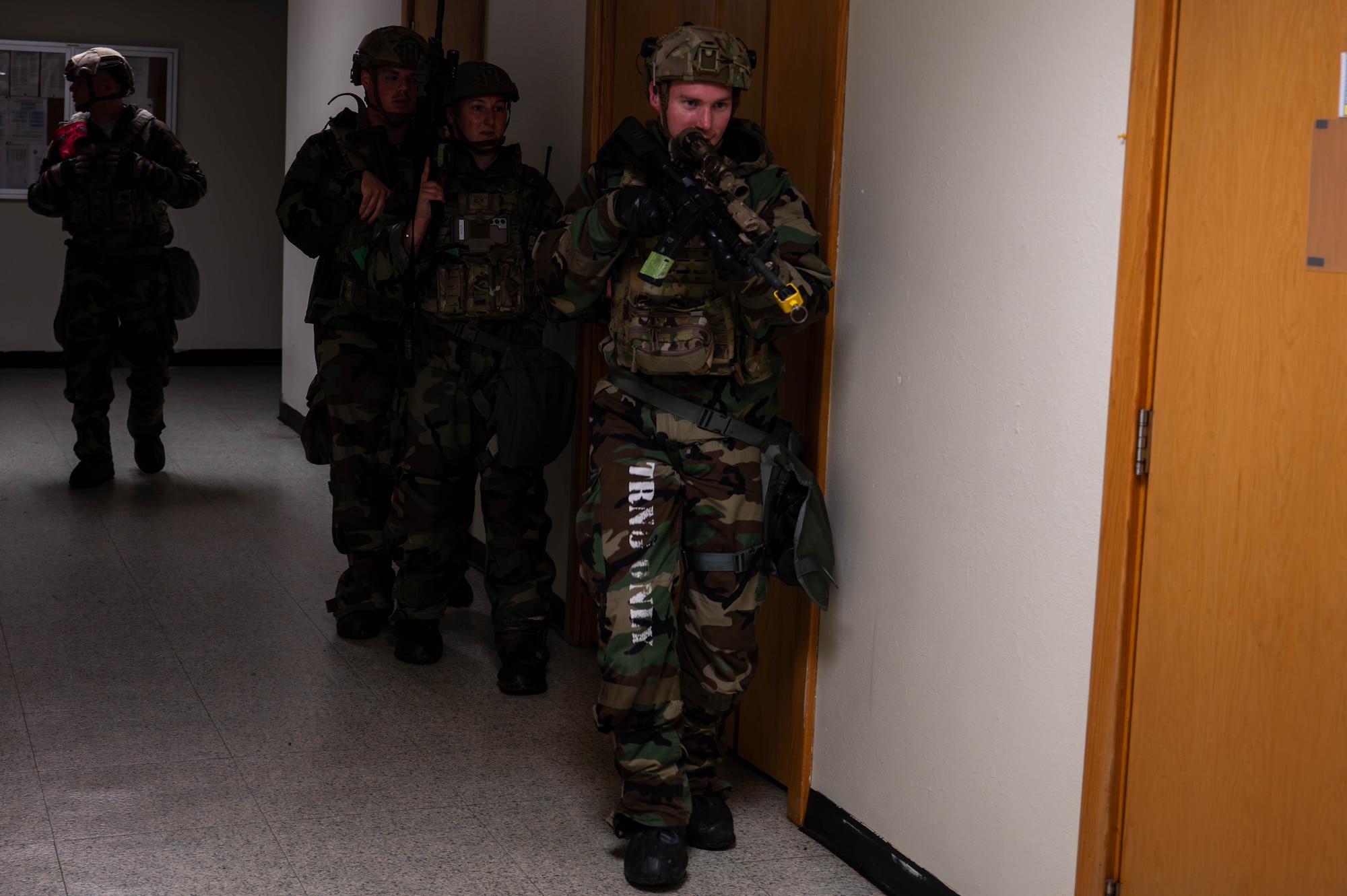 U.S. Air Force Airmen assigned to the 8th Security Forces Squadron perform a security sweep during exercise Beverly Sentinel 26-4, at Kunsan Air Base, Republic of Korea, July 23, 2026. A primary objective of the exercise was validating base defense protocols and ensuring the 8th Fighter Wing could securely receive and integrate follow-on forces during a crisis. (U.S. Air Force photo by Staff Sgt. Cedrique Oldaker)
