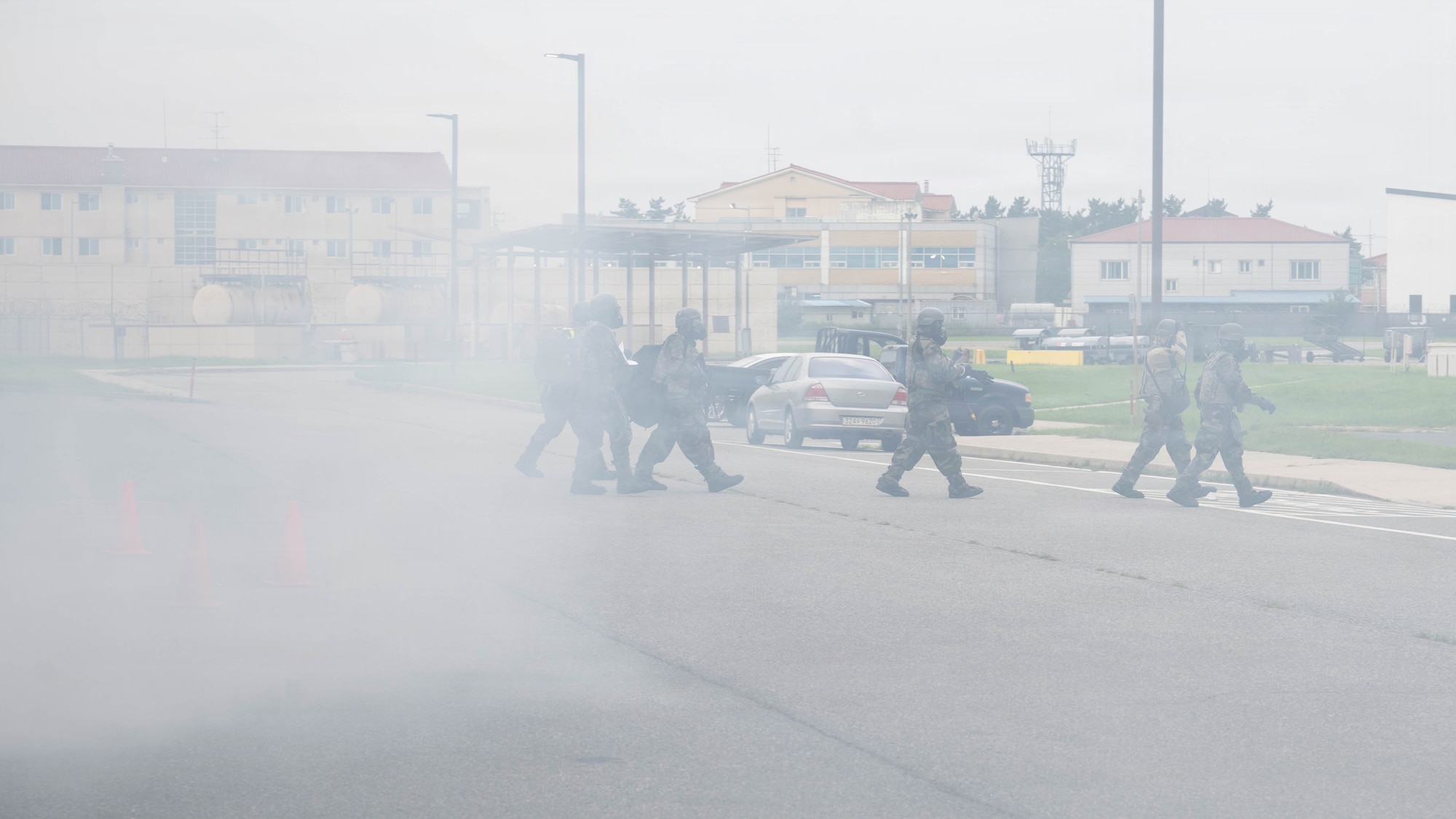 Airmen evacuate.