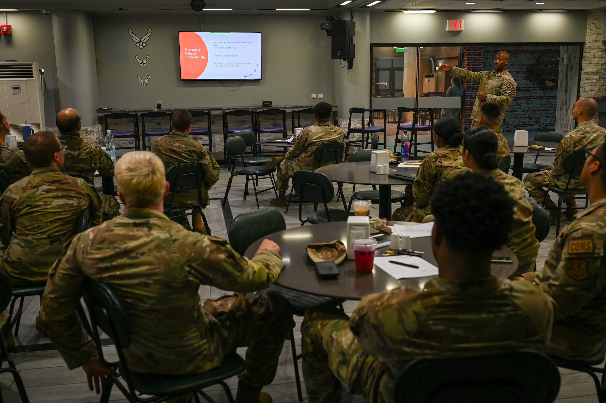 U.S. Air Force Senior Master Sgt. Tahime Green, 728th Air Mobility Squadron flight chief, leads a Communication and Professional Skills workshop for noncommissioned officers.
