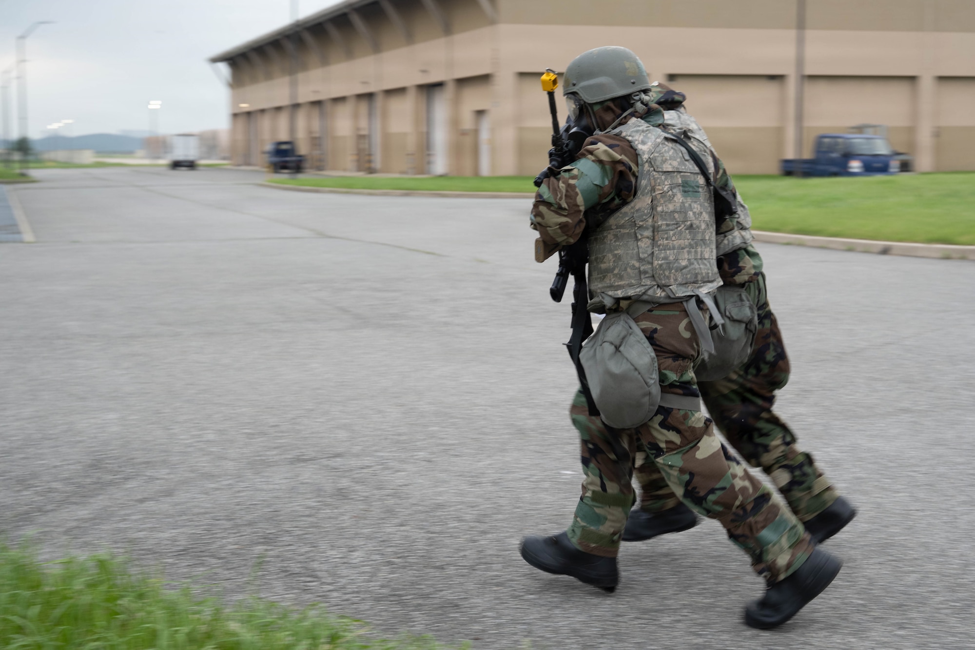 Airmen evacuate.