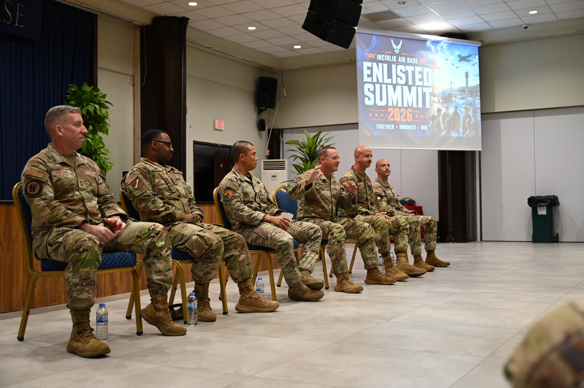 U.S. Air Force Chief Master Sergeants speak to enlisted members.