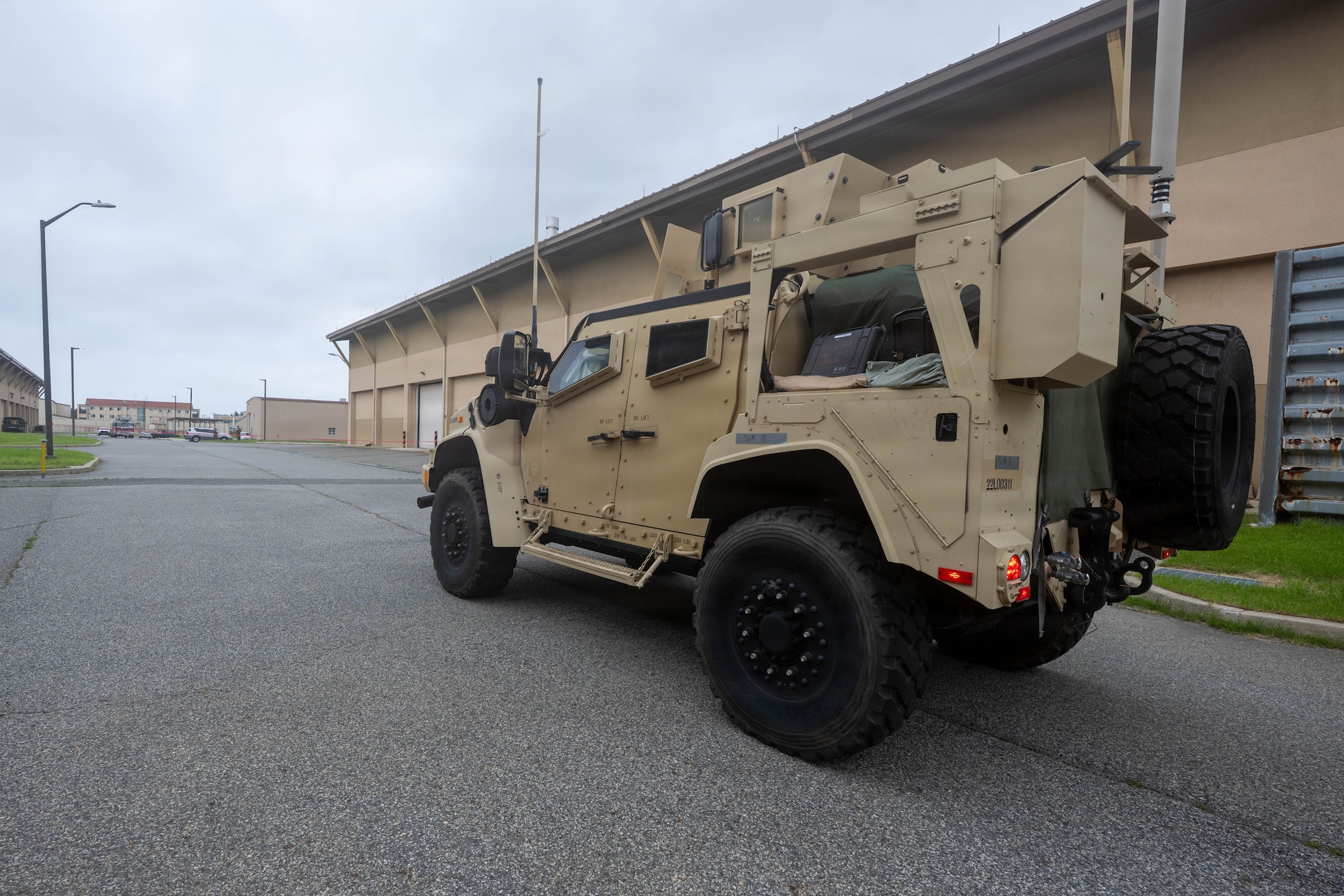 A joint lightweight tactical vehicle waits for scenario to begin.