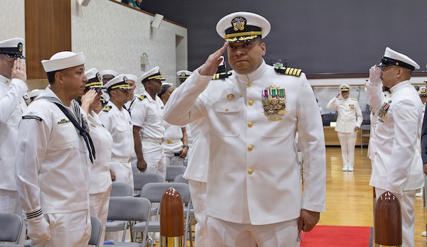 YOKOSUKA, Japan (July 23, 2026) — Capt. Torrin W. Velazquez passes through sideboys as he arrives for the U.S. Navy Medicine Readiness and Training Command (USNMRTC)  Yokosuka change of command ceremony at Commander, Fleet Activities Yokosuka's C2 Auditorium. Velazquez transferred command of USNMRTC Yokosuka to Capt. Joshua A. Miller after serving as commanding officer since June 2024. USNMRTC Yokosuka delivers patient- and family-centered healthcare while developing and delivering trained, ready medical forces in support of U.S. Indo-Pacific Command. (U.S. Navy photo by Daniel Taylor/USNH Yokosuka Public Affairs)