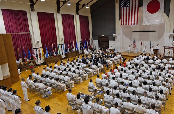 YOKOSUKA, Japan (July 23, 2026) — Capt. Torrin W. Velazquez delivers farewell remarks during the U.S. Navy Medicine Readiness and Training Command Yokosuka change of command ceremony at Commander, Fleet Activities Yokosuka's C2 Auditorium. Velazquez transferred command to Capt. Joshua A. Miller following two years leading the command and U.S. Naval Hospital (USNH) Yokosuka. USNMRTC Yokosuka delivers patient- and family-centered healthcare while developing and delivering trained, ready medical forces in support of U.S. Indo-Pacific Command. (U.S. Navy photo by Daniel Taylor/USNH Yokosuka Public Affairs)