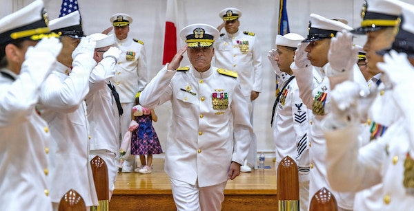 YOKOSUKA, Japan (July 23, 2026) — Rear Adm. Kevin J. Brown, commander, Naval Medical Forces Pacific; director, Defense Health Network Pacific Rim; and chief of the Navy Medical Corps, departs through sideboys following the U.S. Navy Medicine Readiness and Training Command Yokosuka change of command ceremony at Commander, Fleet Activities Yokosuka's C2 Auditorium. Brown officiated the transfer of command from Capt. Torrin W. Velazquez to Capt. Joshua A. Miller. USNMRTC Yokosuka delivers patient- and family-centered healthcare while developing and delivering trained, ready medical forces in support of U.S. Indo-Pacific Command. (U.S. Navy photo by Daniel Taylor/USNH Yokosuka Public Affairs)