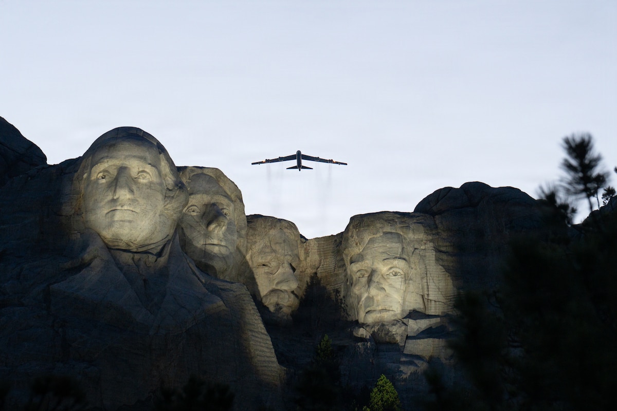 A B-52 Stratofortress assigned to the 5th Bomb Wing flies over Mount Rushmore National Memorial, S.D., during a Freedom 250 celebration, July 3, 2026. The B-52 remains a key component of America's long-range strategic deterrence capability. (U.S. Air National Guard photo by 2nd Lt. Jorrie Hart) 
