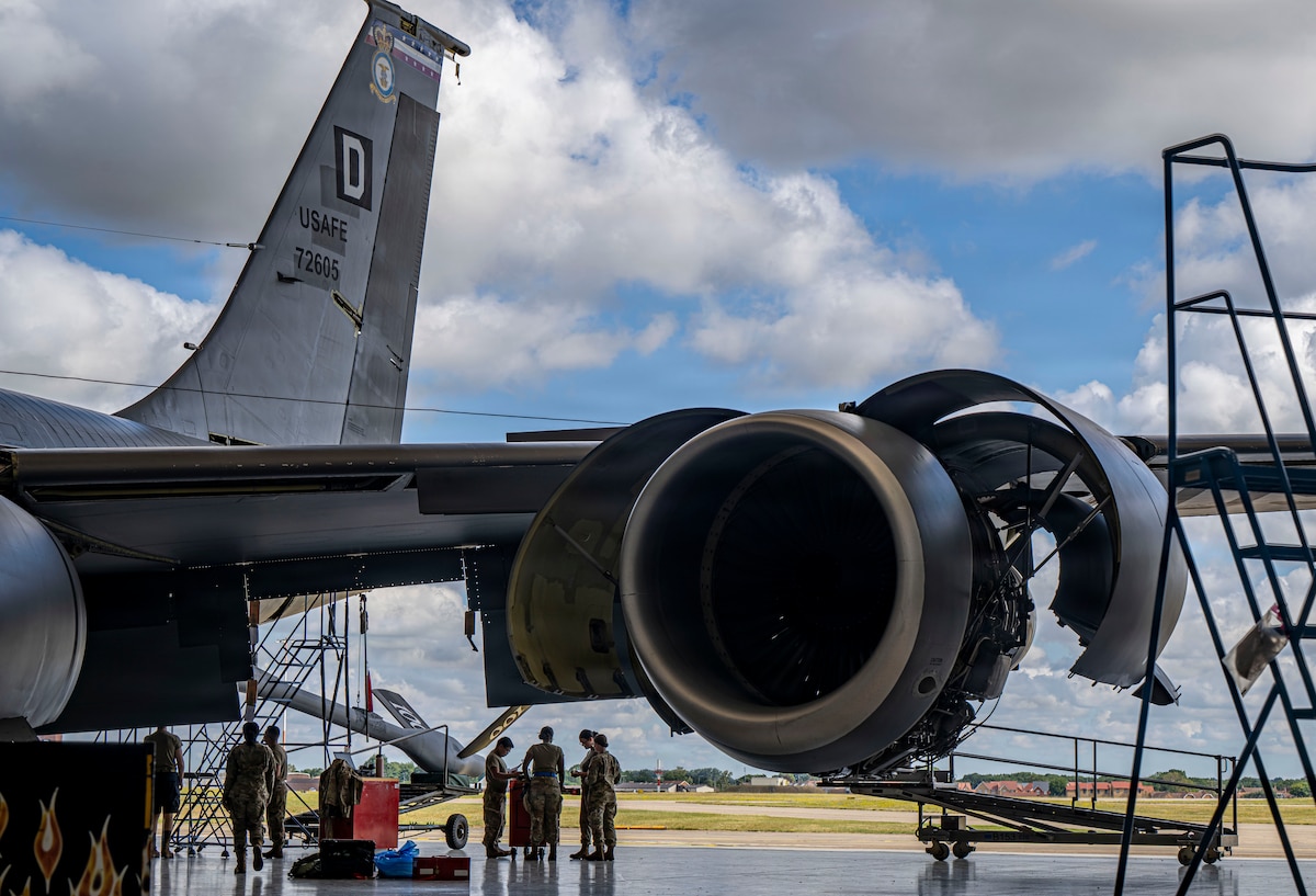 A U.S. Air Force KC-135 Stratotanker assigned to the 100th Air Refueling Wing undergoes inspection and maintenance inside a hangar, July 1, 2026, at RAF Mildenhall, United Kingdom. The aircraft was de-paneled and inspected by multiple maintenance organizations during a two-day maintenance effort. (U.S. Air Force photo by Senior Airman Cody J. A. Mott)