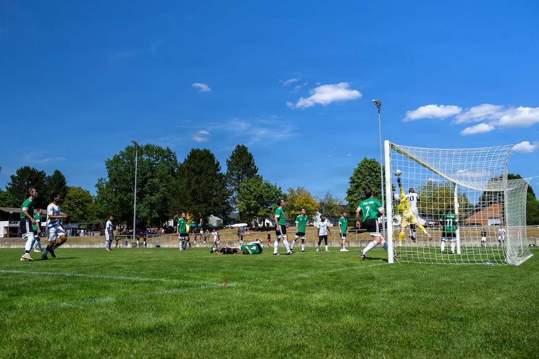 People play soccer.