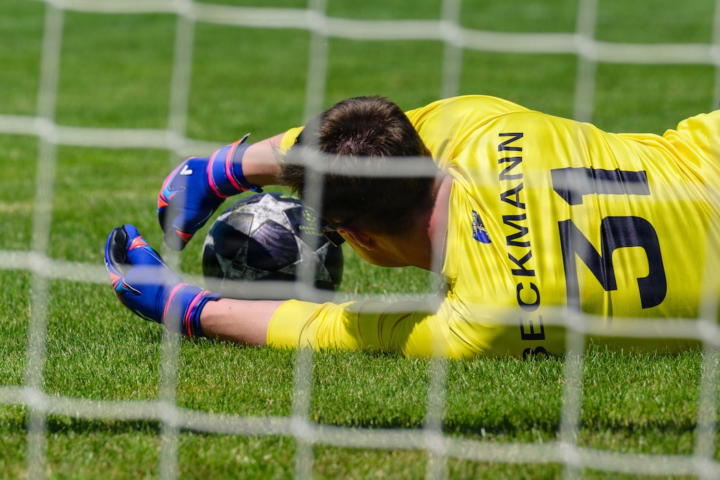 People play soccer.