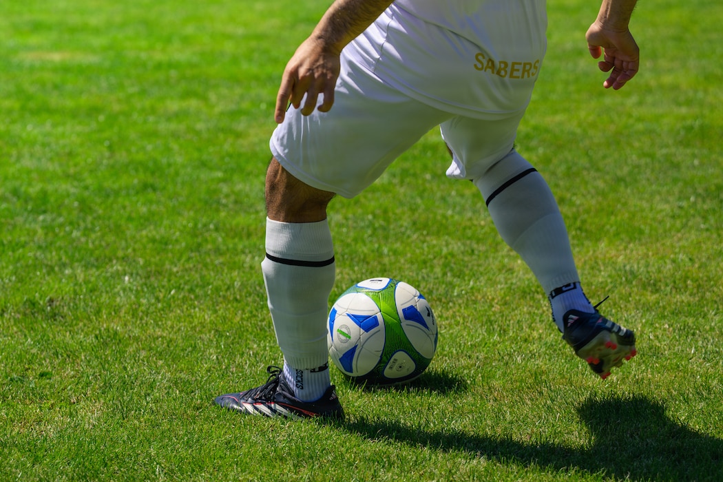 People play soccer.