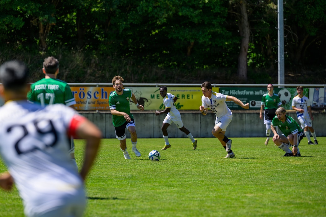 People play soccer.