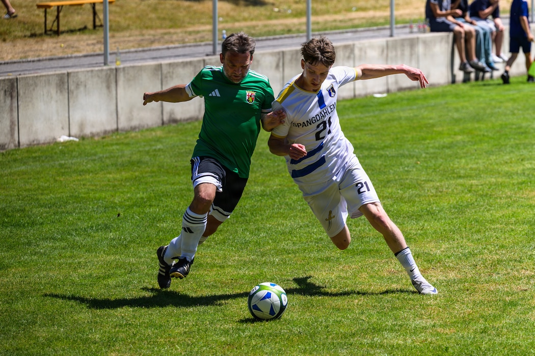 People play soccer.