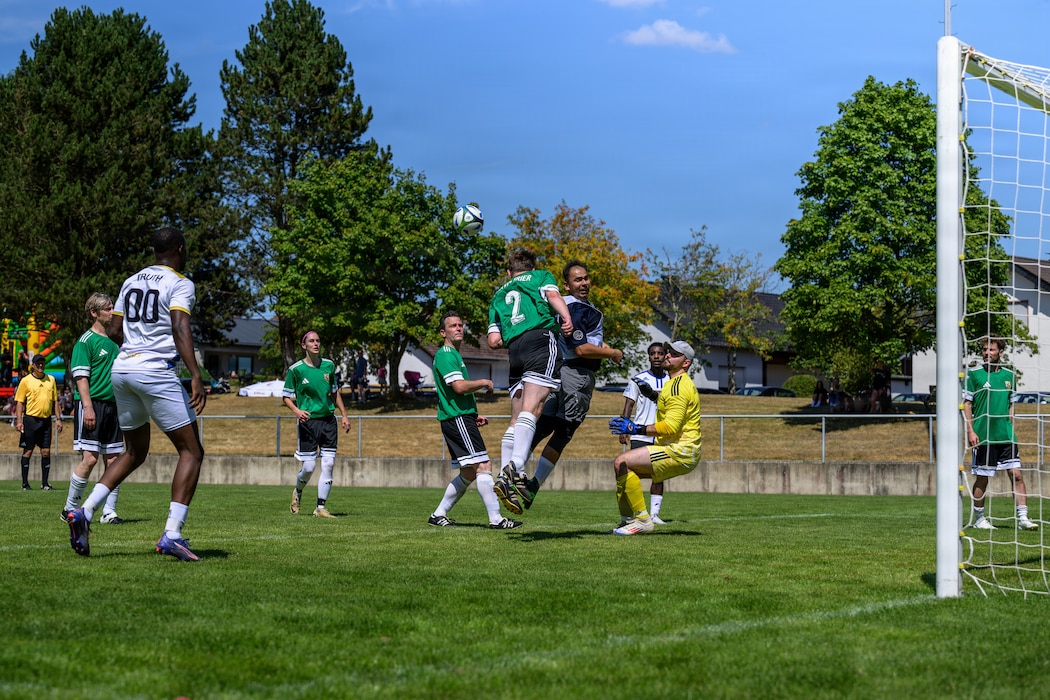 People play soccer.
