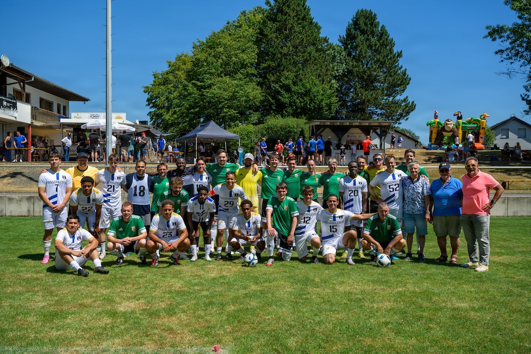People play soccer.