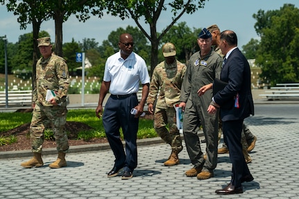 U.S. Air Force Maj. Gen. walks with JBAB leadership at the Air Force Memorial