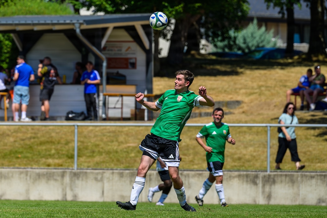 People play soccer.