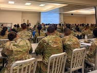 U.S. Airmen with the Air National Guard assigned to force support squadrons from Colorado, Nevada, Oregon and Puerto Rico, attend a briefing during the fiscal year 2026 Home Station Readiness Training at Joint Base Pearl Harbor-Hickam, Hawaii, June 16, 2026.