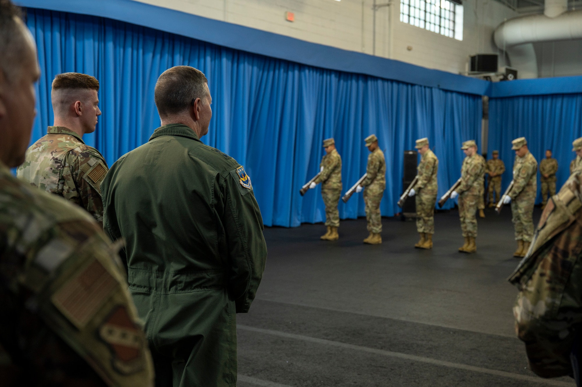 U.S. Air Force Maj. Gen. Stands watching The Honor Guard Drill Team